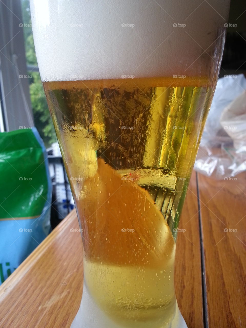 beer bubbles. a beer poured into a chilled glass