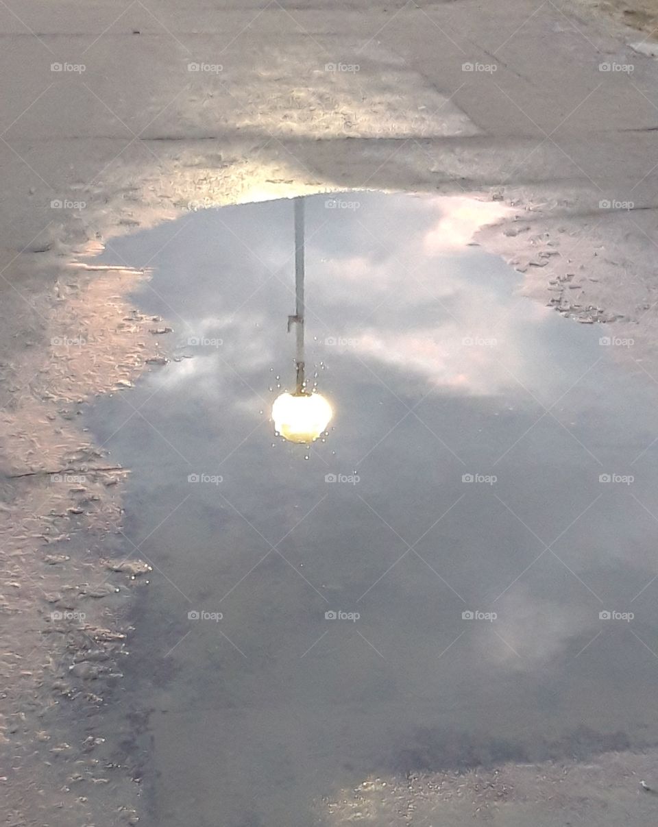 reflection on the sidewalk of Deauville