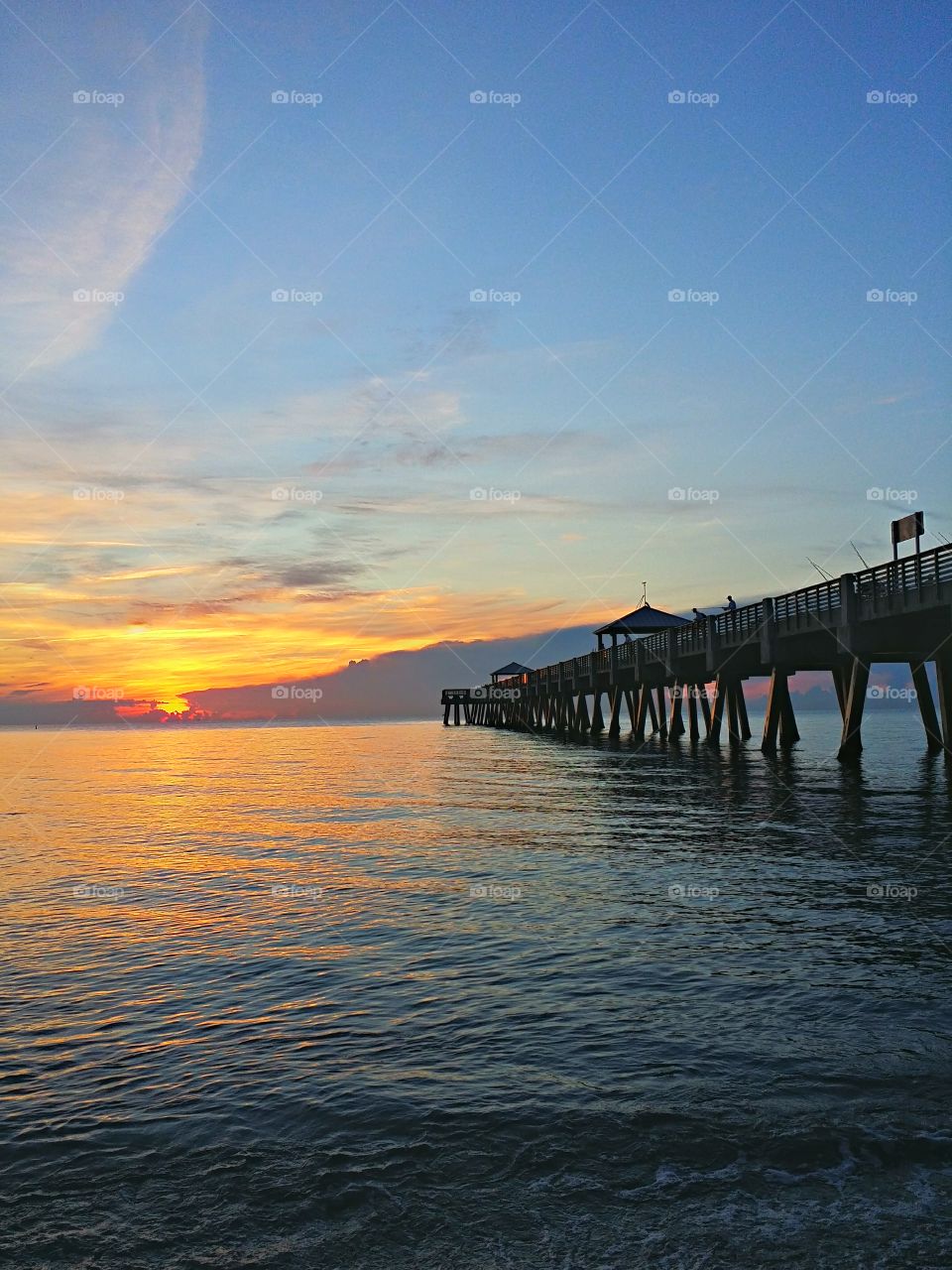 Sunrise at the Pier. Beautiful sunrise promises a great day!