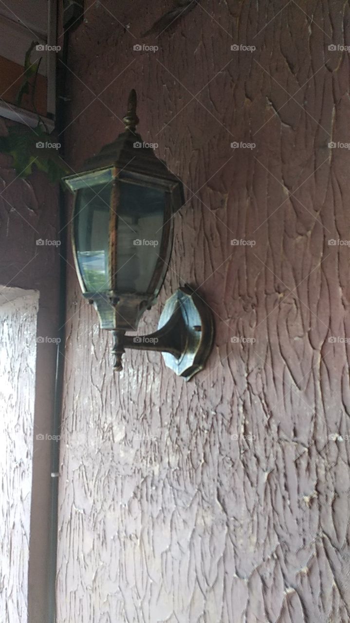 Lamp on a wall in cafe