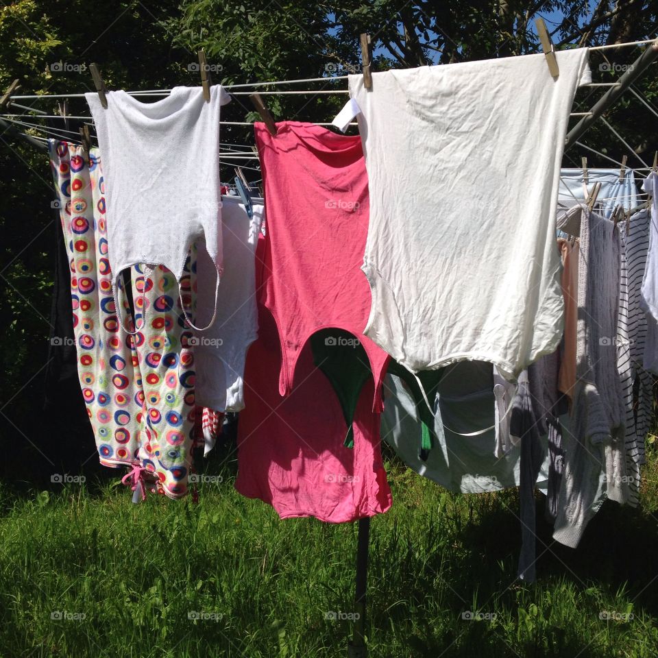 Clothes on washing line. Clothing on washing line in the sun
