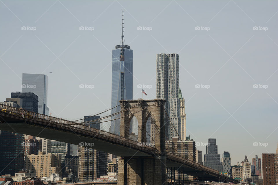 Brooklyn bridge and a boat