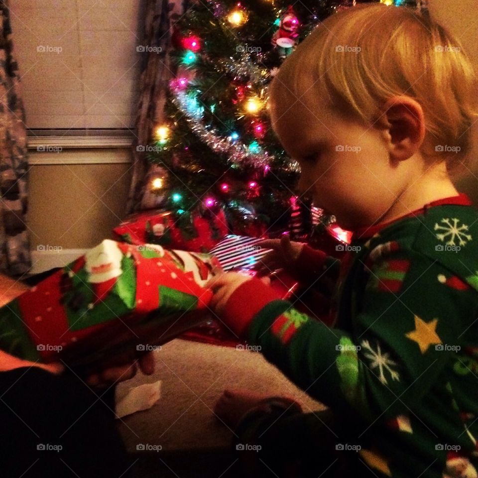 Child opening a gift