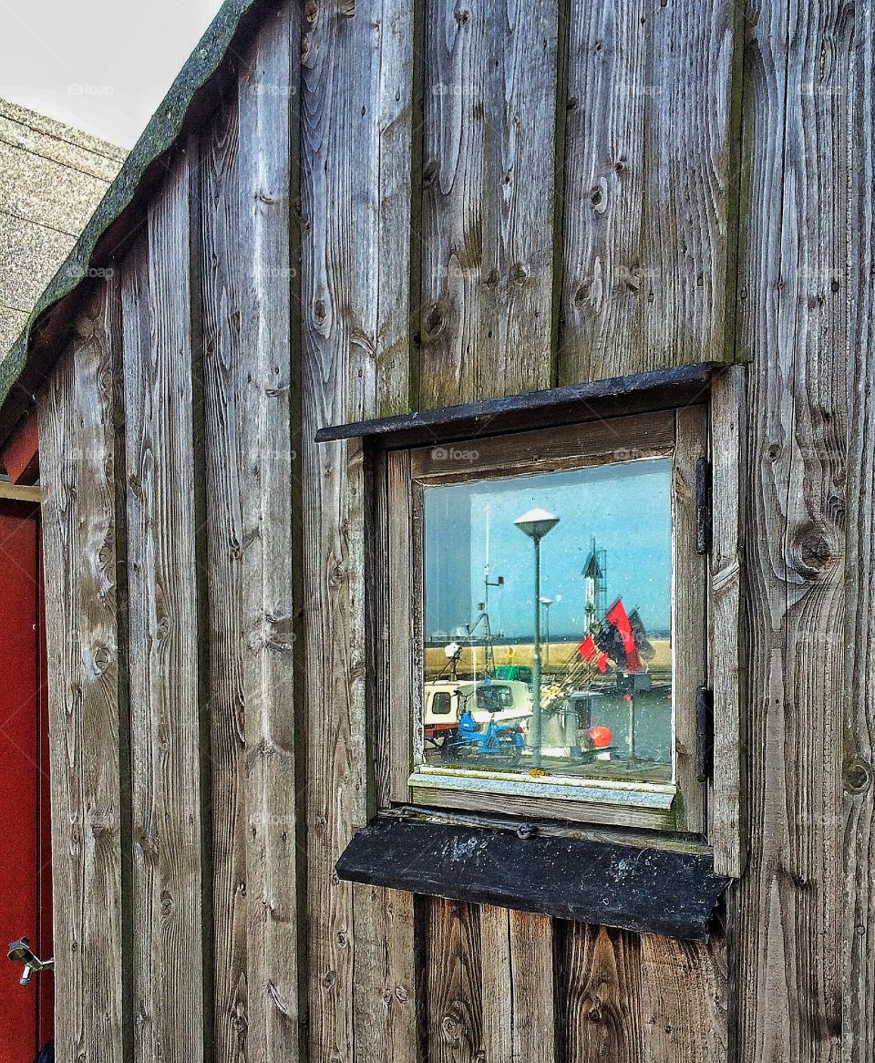 Reflections of the harbour in Abbekås