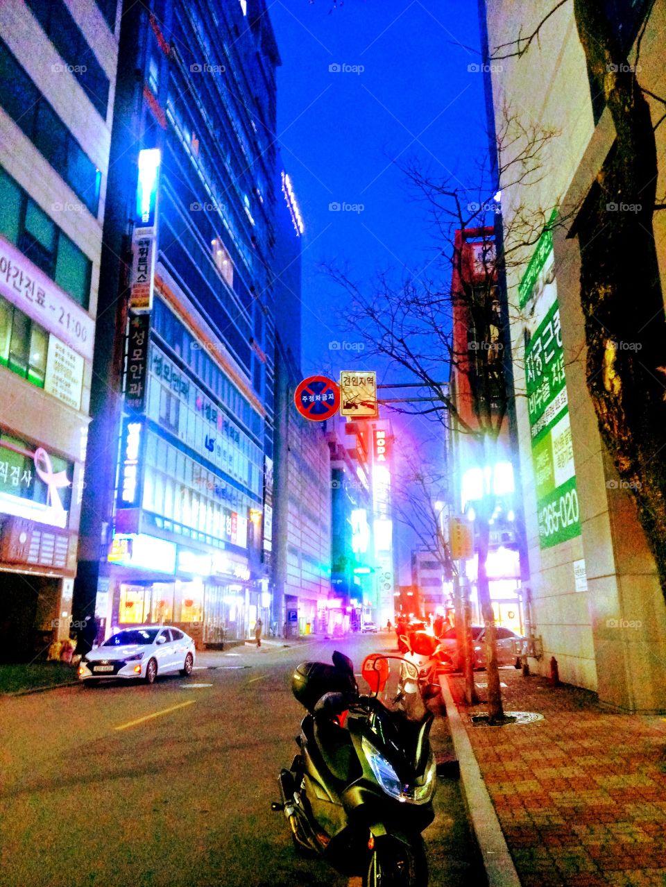 looking up those high buildings in yangsan city south korea makes me amaze for it looks like reaching the blue skies above me.