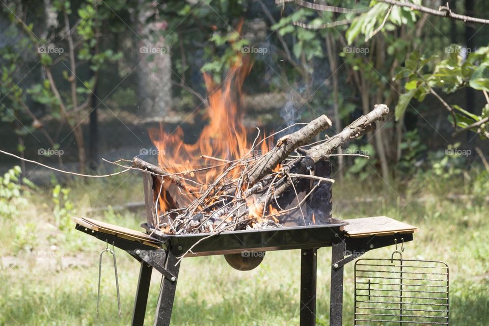 Barbecue and fire in the yard 