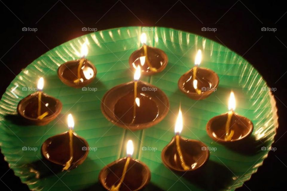 Title- Light up your World
Description- Diyas(small lamp) of Diwali festival of India.Diya is an oil lamp used in Indian subcontinent made from clay and with a cotton wick dipped in ghee and vegetable oils.