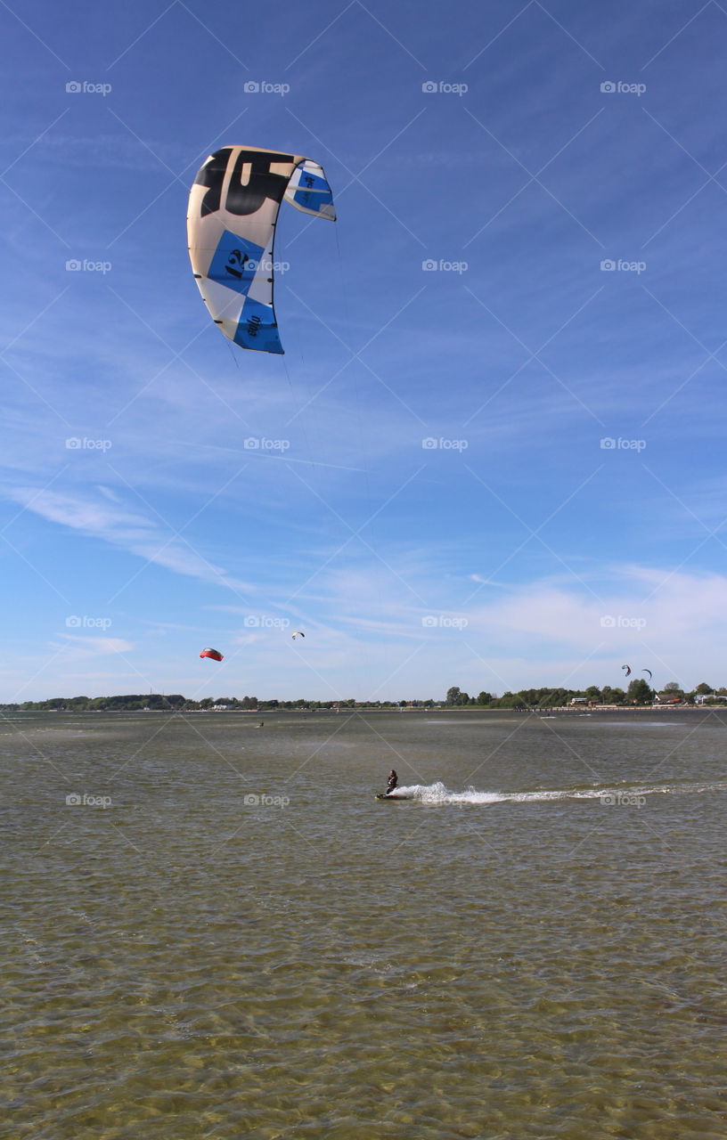 Wakeboarding parachute in Lomma, Sweden.