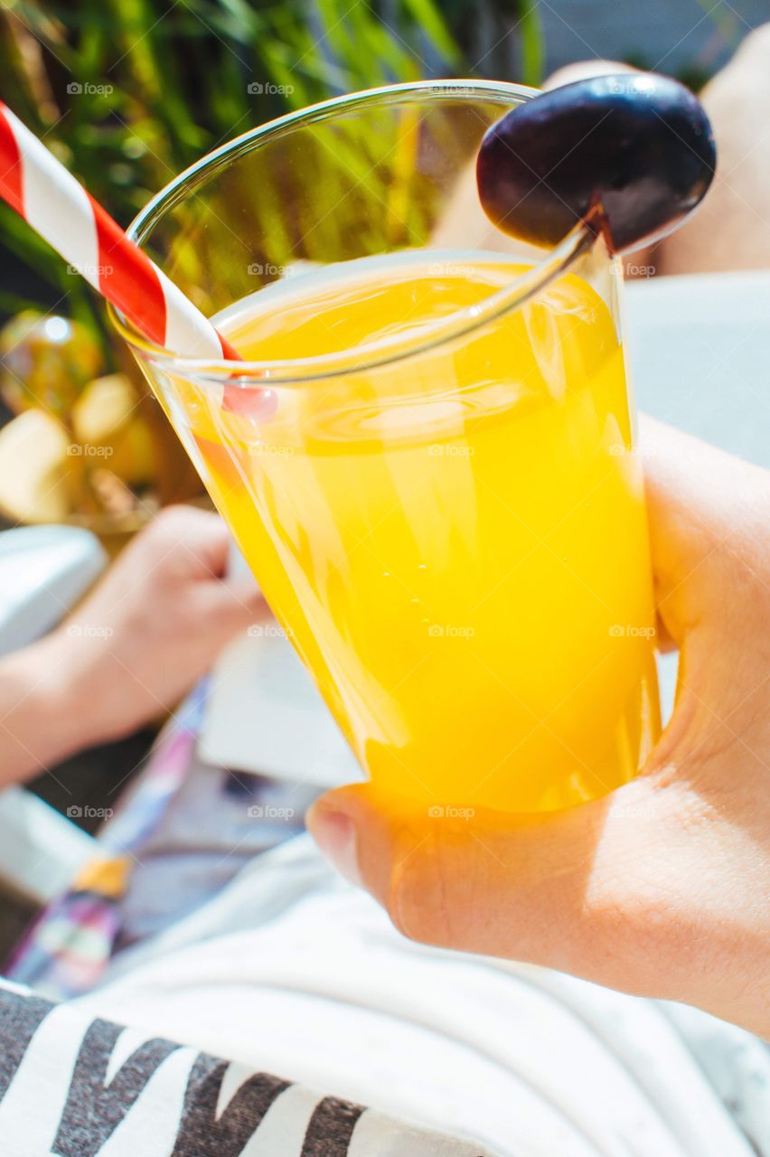 Summer drink with a red straw