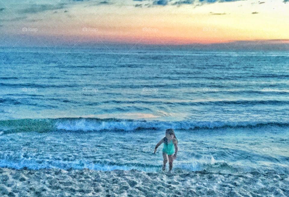 Sunset girl on the beach