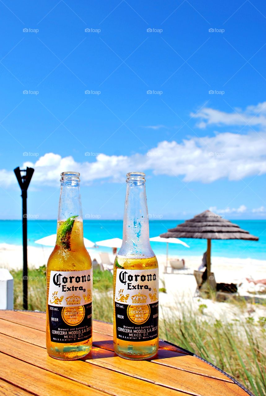 Two Coronas on the Beach, Brunch, Beer, Turks and Caicos, Tropical, Bahamas, White Sandy Beach, Drinks, Corona Extra, Lime