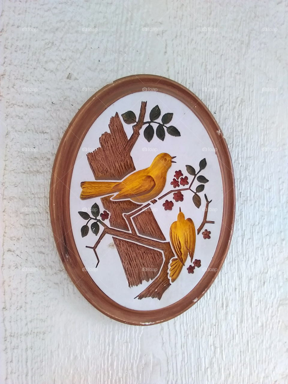 Painted plaster relief