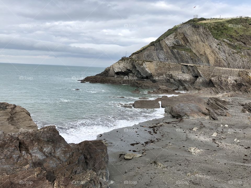 The coastline and beach at Ilfracombe, Devon on a warm but cloudy day, still a wonderful sight to enjoy.