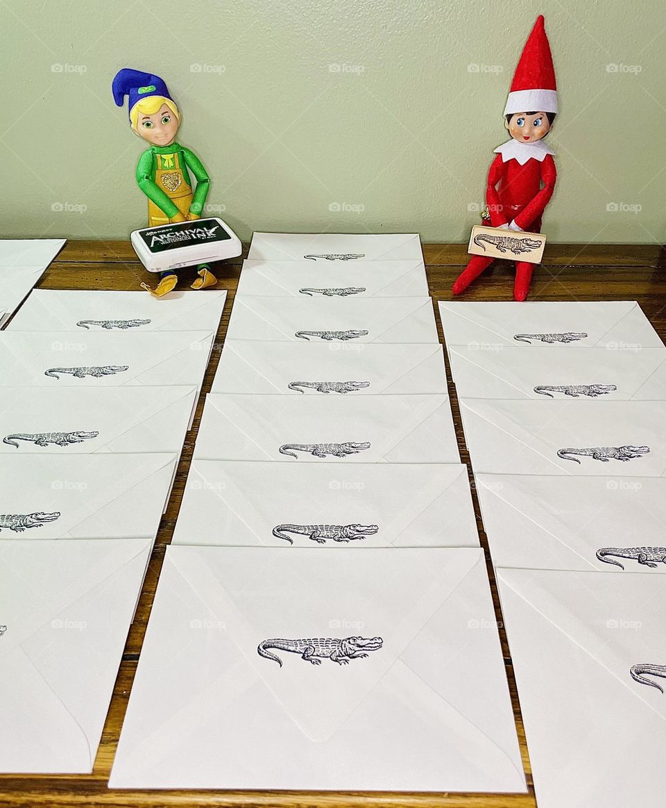 Elf on the shelf helps mail out Christmas Cards, the Christmas Crocodile, mailing out cards, celebrating Christmas, Elf on the Shelf antics