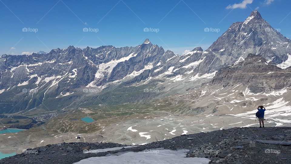 Hiking in the Alps on high altitude in Cervinia Italy 