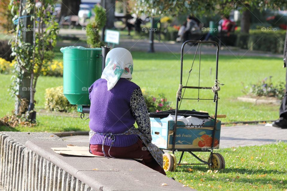 Woman taking a break in the park in lake orchid Macedonia 