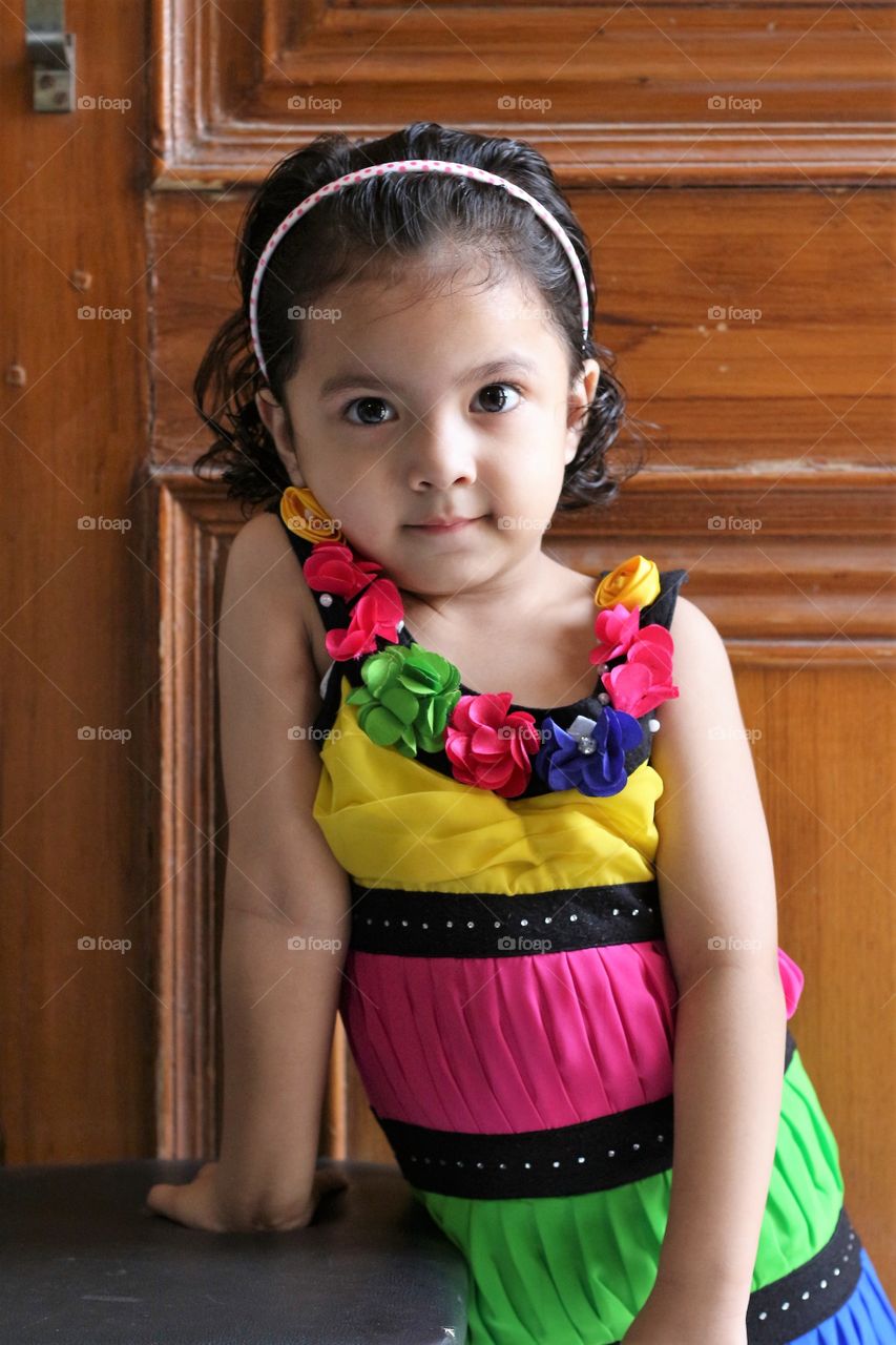 Portrait of a girl with colorful dress