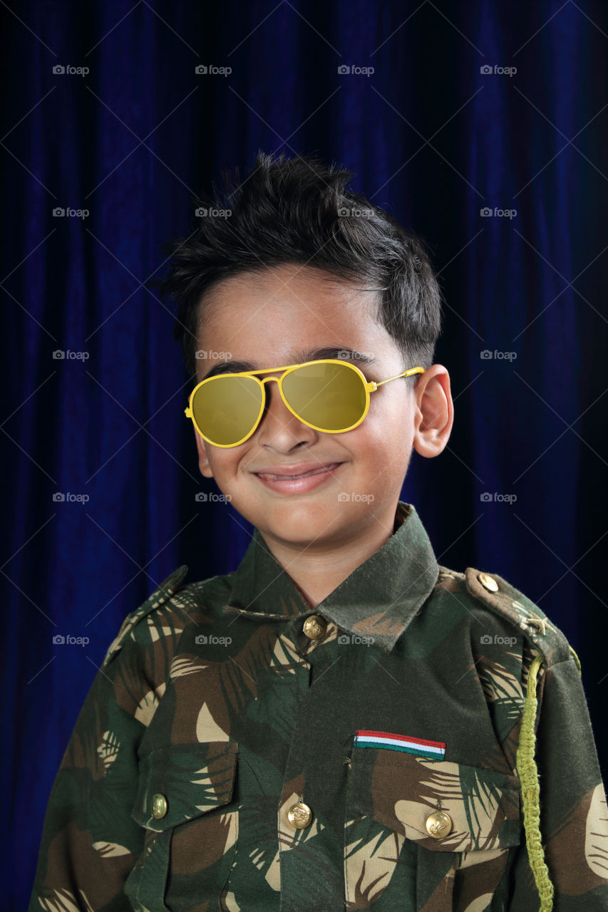 Little Indian kid dressed as Army Officer