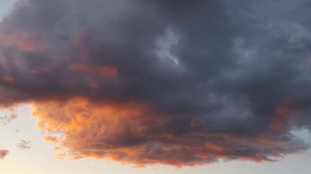 Sunset reflecting off dark clouds.