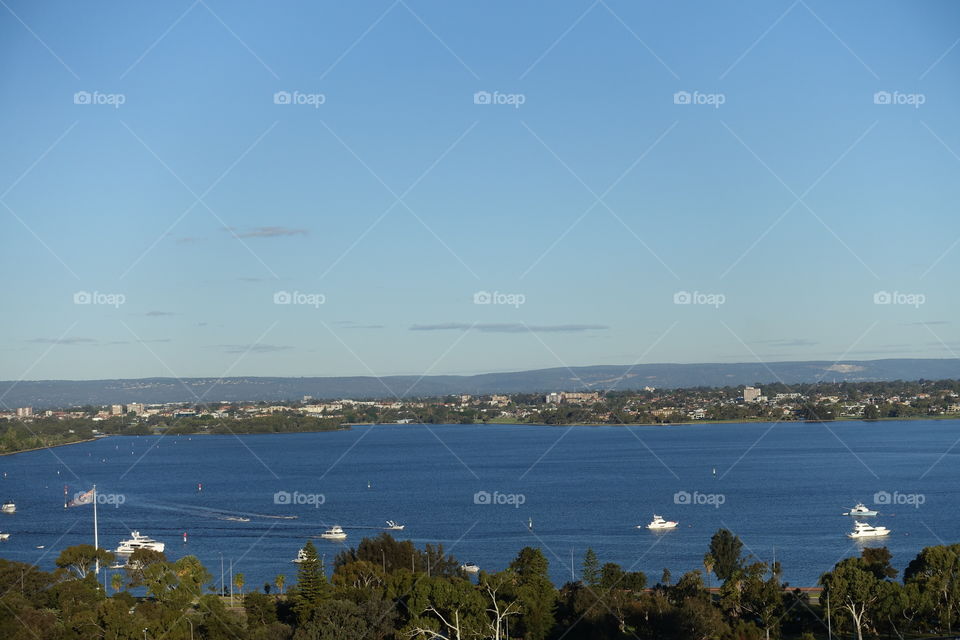 The landscape from Kings Park. Several boats can be seen on the Swan River.