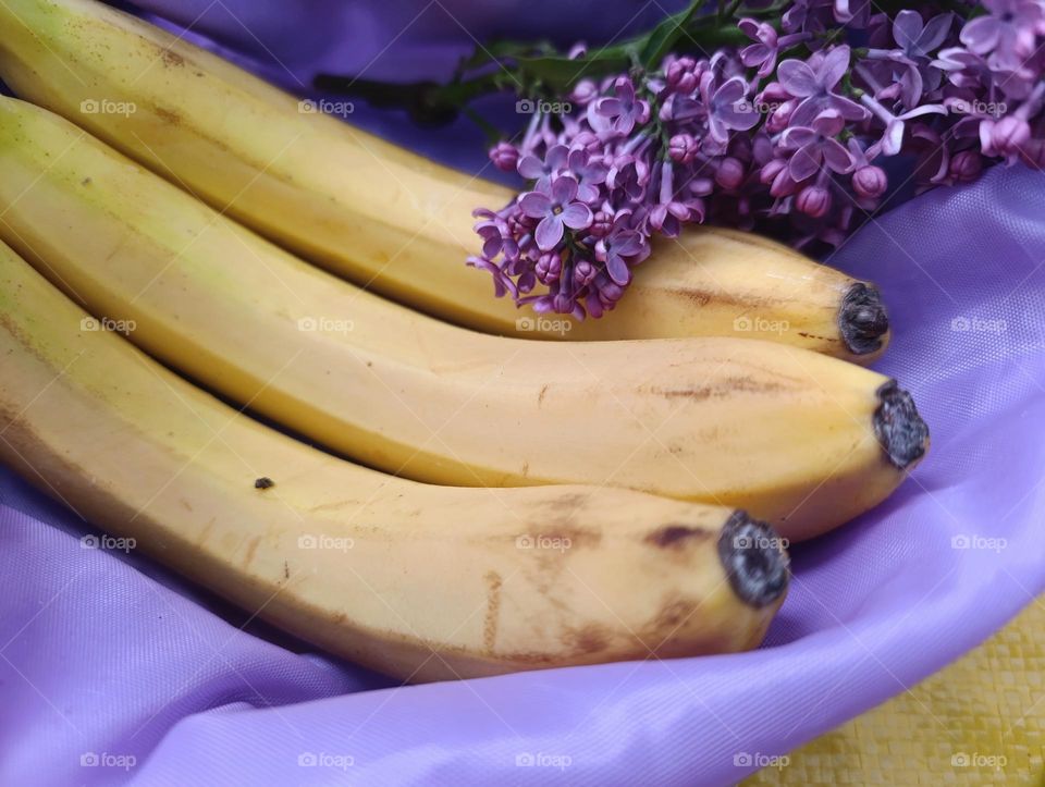 yellow bananas in the purple bag.