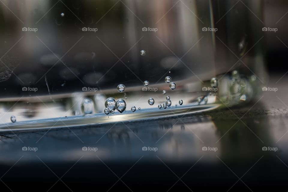 Close-up of drops in rippled water