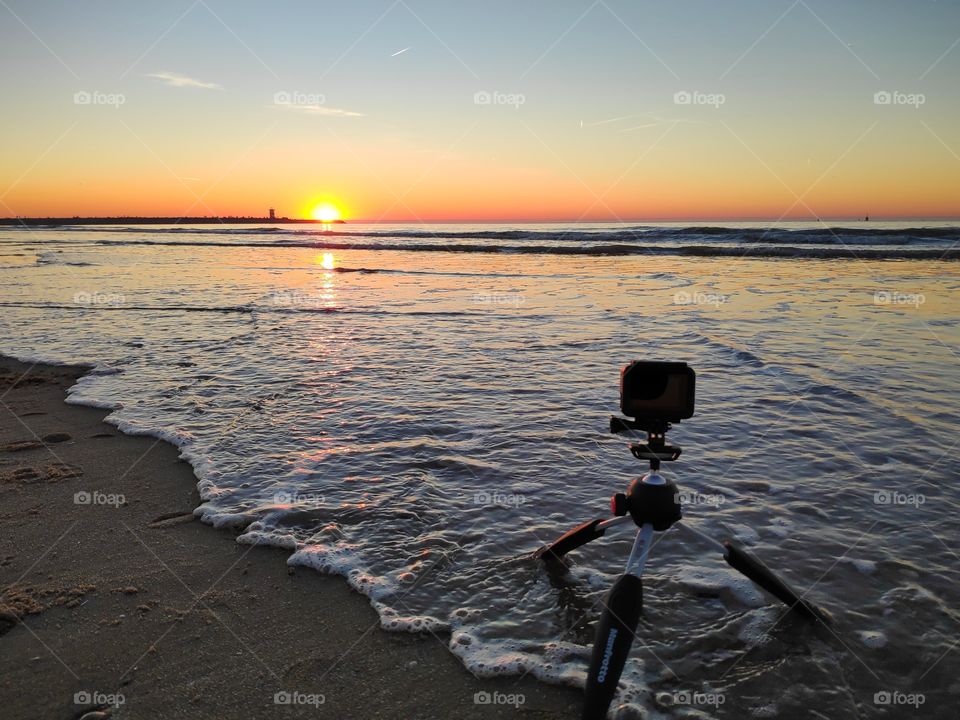 Sunset at the beach filming with GoPro on a tripod