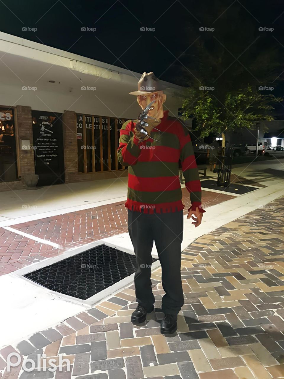 Freddy Kruger, character, pose on the street at night.