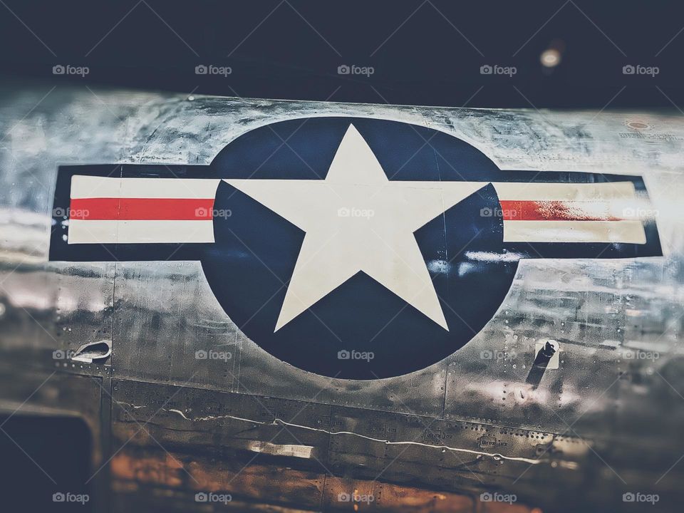 Military aircraft, symbols on military aircrafts, closeup of a star, red white and blue, USAF vehicles 