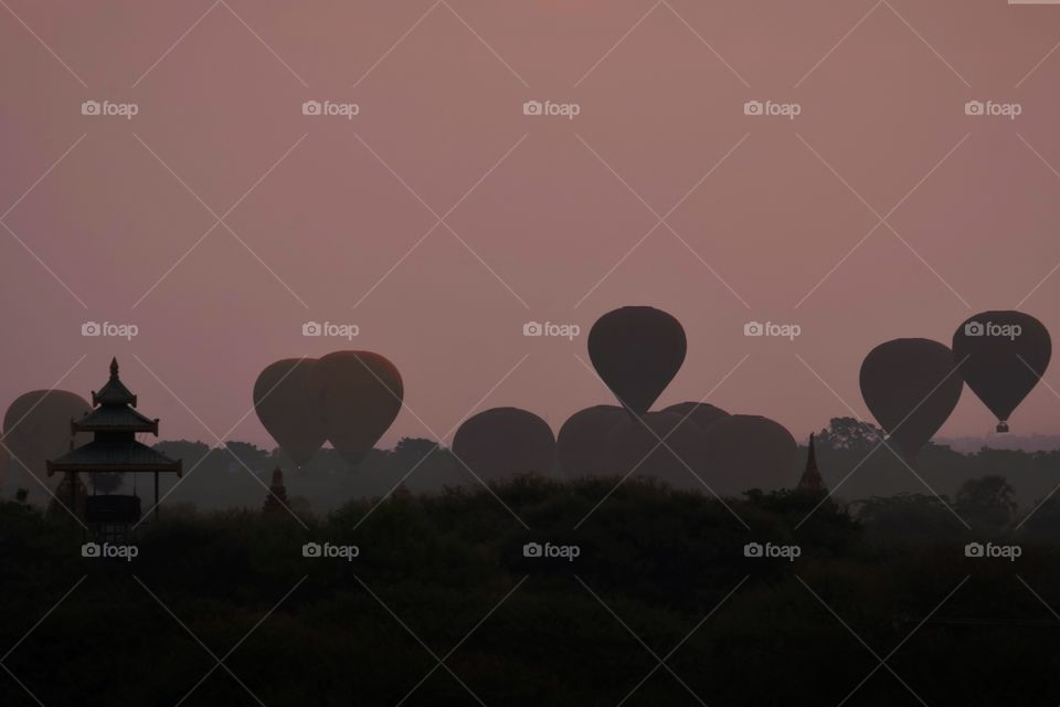Silhouette balloon on twilight background