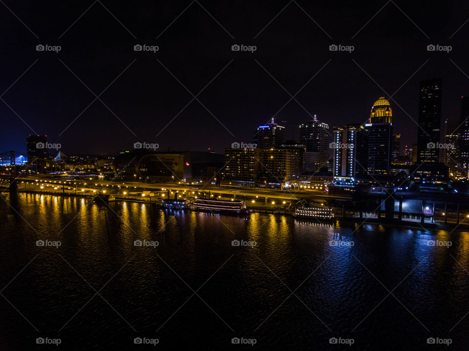 Downtown Louisville at night over the Ohio River