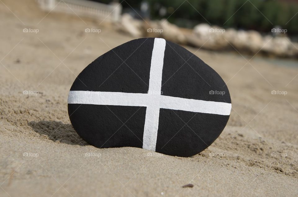Flag of the English county of Cornwall on a stone