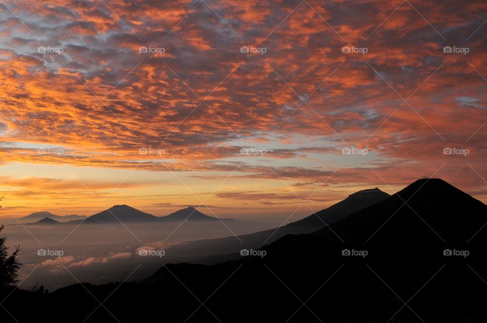 Golden sunrise at the top of Mount Prau