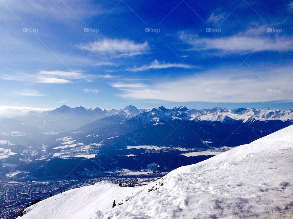 Scenic view of mountain range during winter
