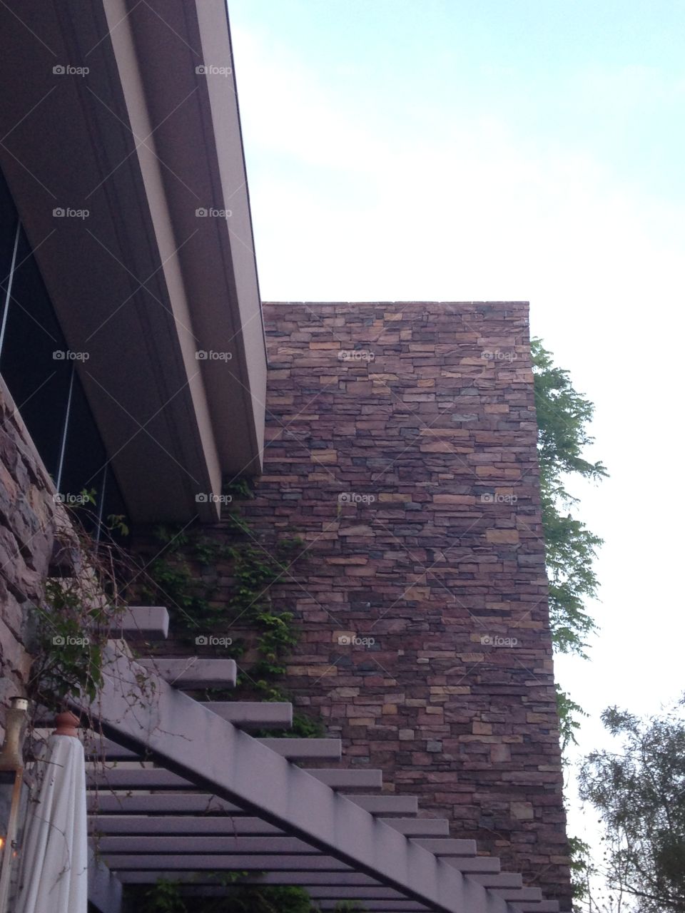 Looking up at outdoor decorative brick wall