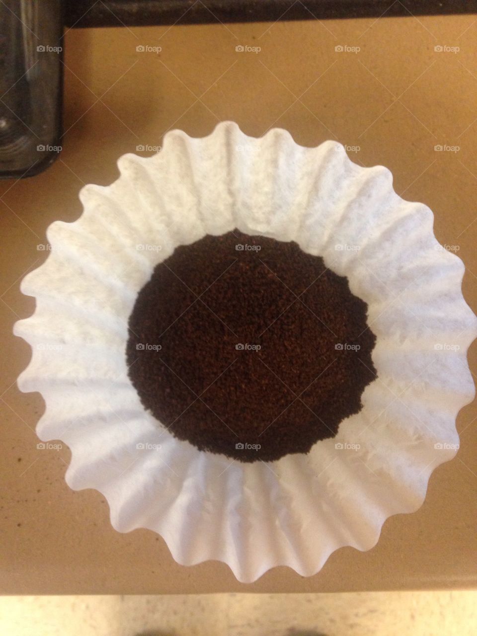 Ground coffee in filter
