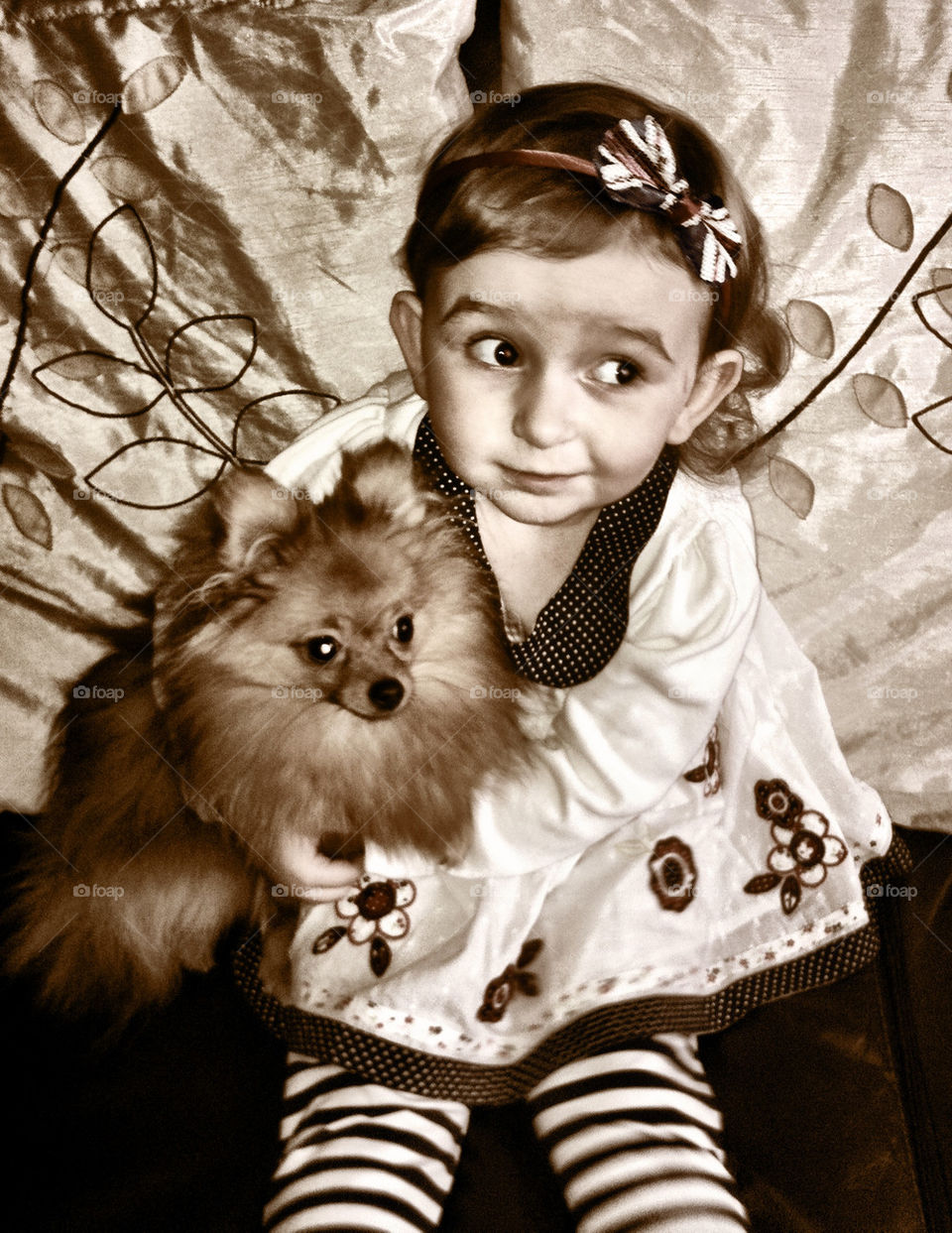 Little girl with puppy dog