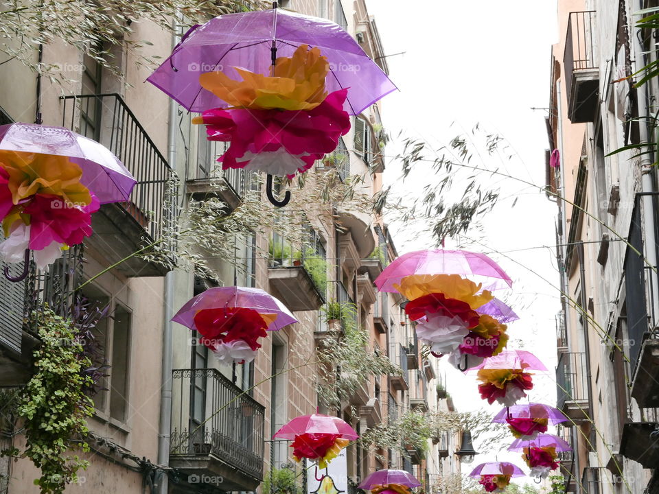 Low angle view of umbrella near building