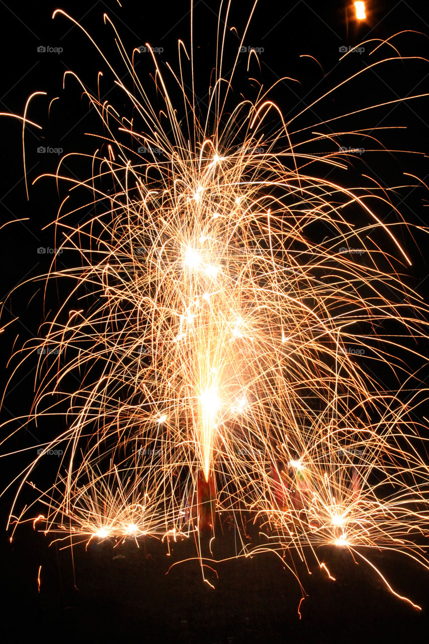 Fireworks display at night