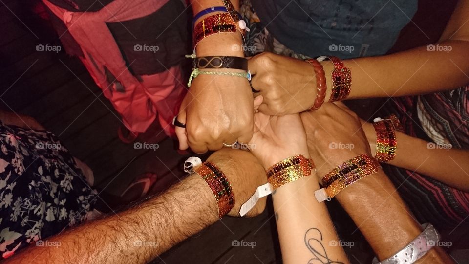 Six hands six bracelets. Family sign . Together 