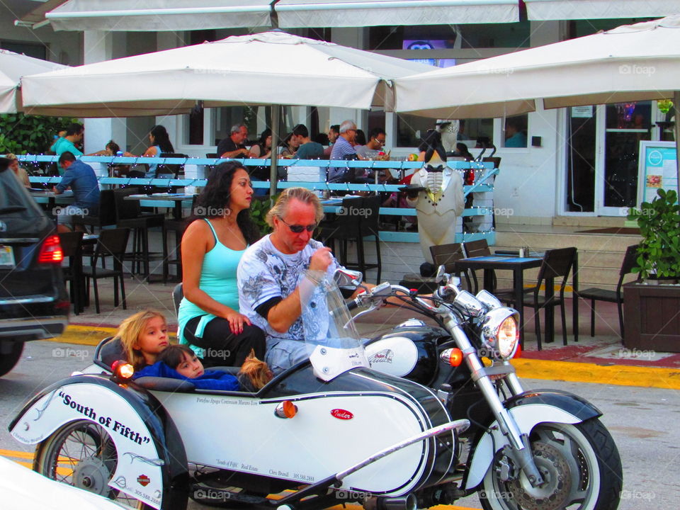 Family on a side car..... dog included!