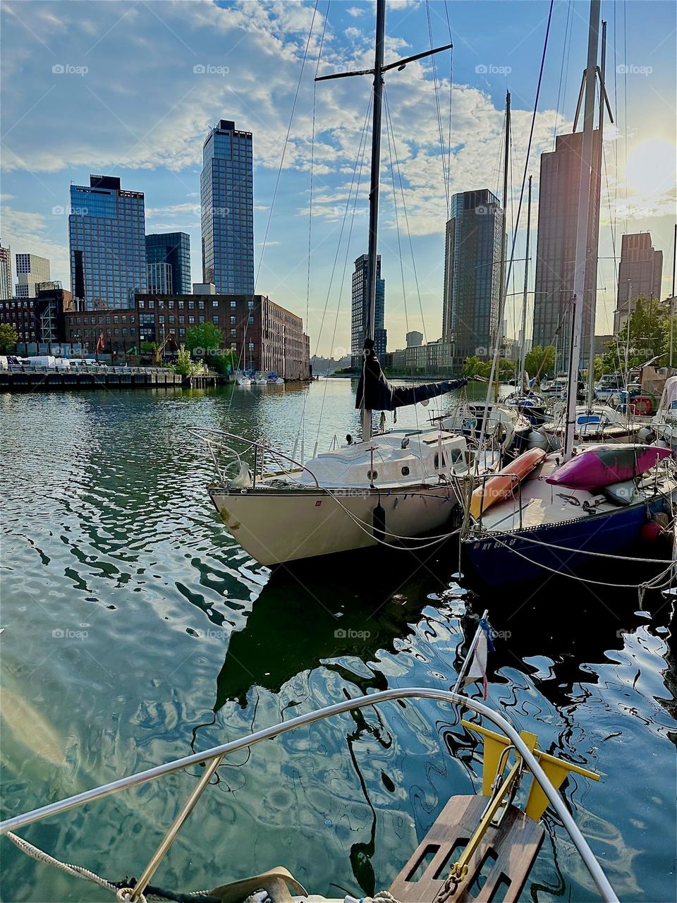 This is beautiful “Newtown Creek” with its many boats seen from aboard “Salvation”, a “28 ft 1969 Luhrs” cabin cruiser by the “Pulaski Bridge” in LIC, Queens on a warm sunny evening in May 2024. Hypnotic Productions