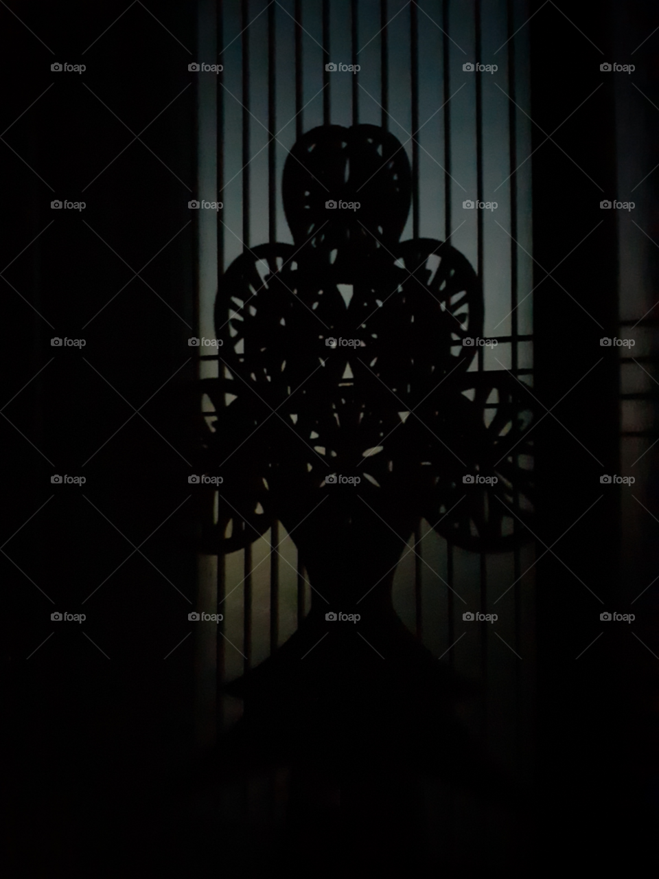 the little snow flakes christmass tree which is made of  cartoons. this is the side ways. with the help of the little light outside the window. i made a very Beautiful  and clear  shadow of it.