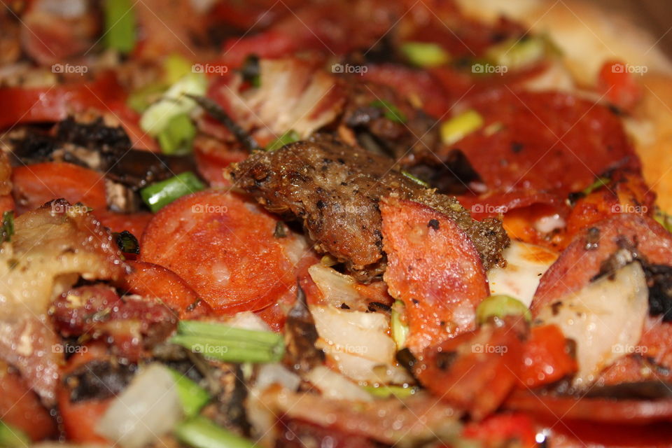 a boulevard specialty pizza with lots of toppings