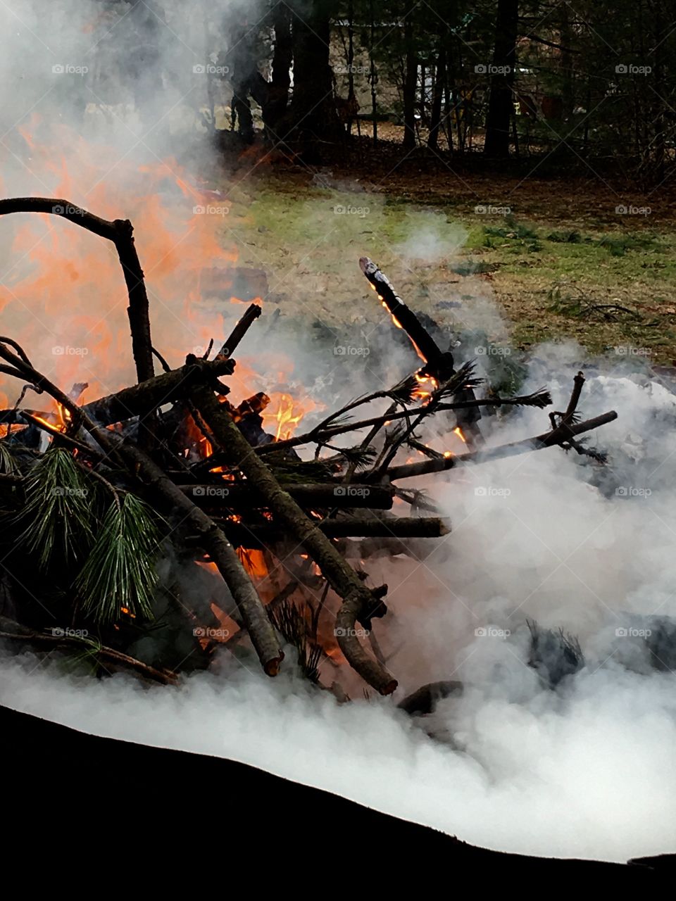 Fire Clean Up Of Pine Branches From Storm
We had lots of pine boughs & branches to burn. They were still fresh fallen so lots of smoke too. Couldn't believe how many branches our pine grove lost these last couple of heavy snowfalls. It's really sad!