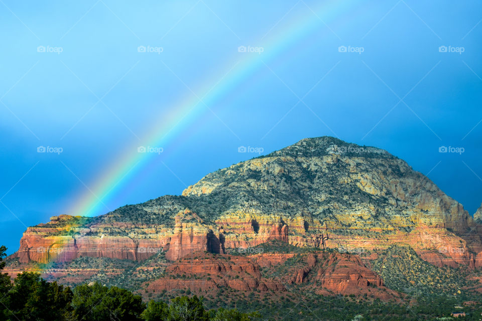 A rainbow by the rocky red mountain in Sedona