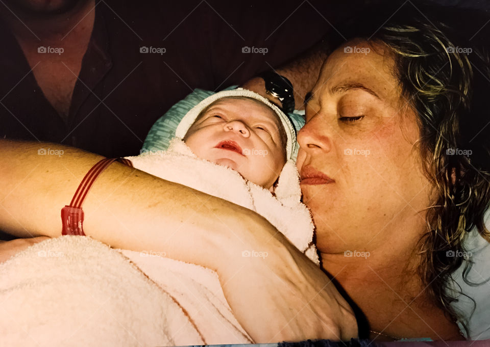 New born baby with her mother