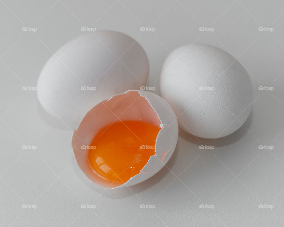 egg yolk on white background 