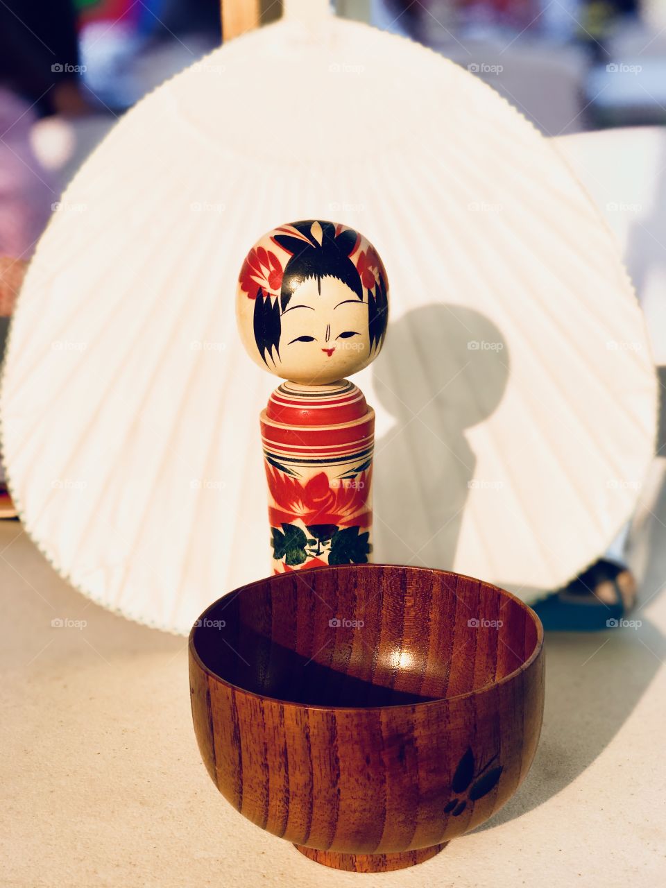 Japanese doll, bowl and fan 