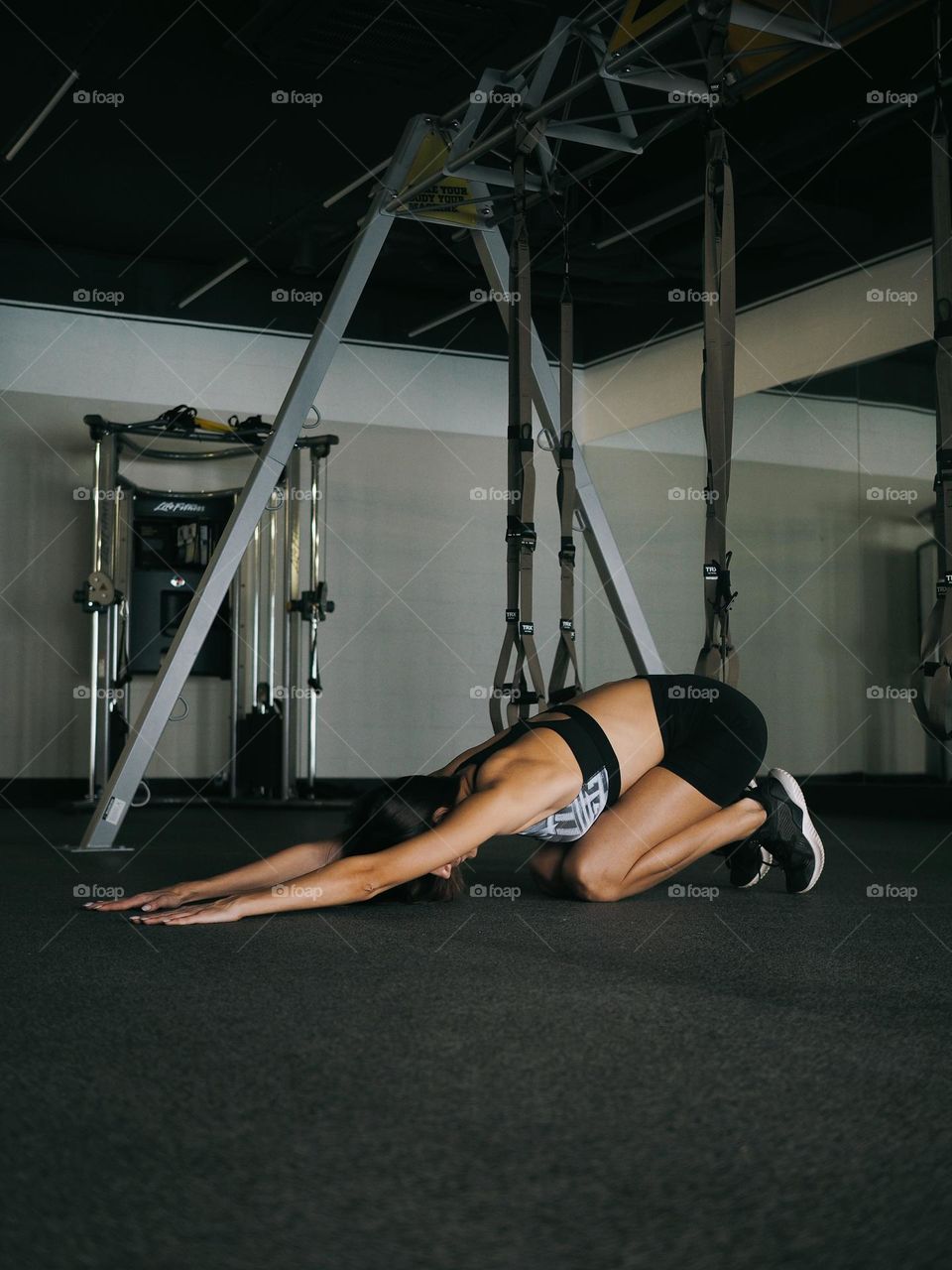 Young woman in gym 